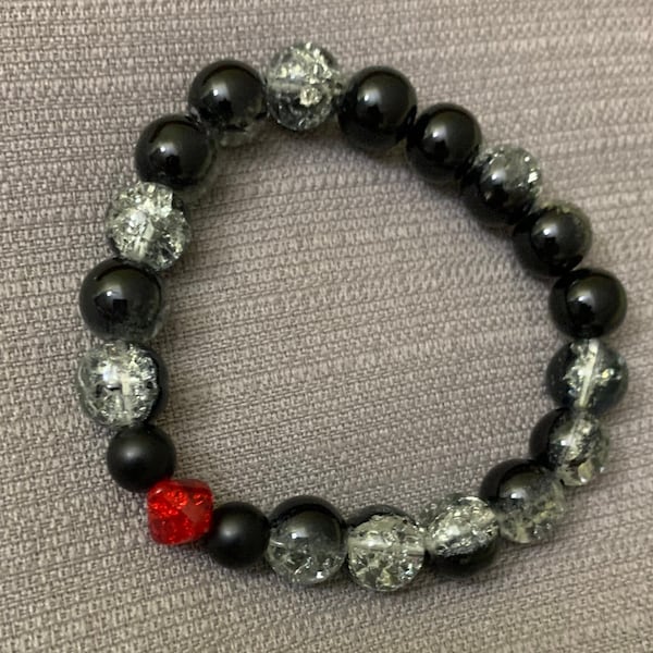 Black crackle glass bead with red glass bead