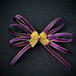 Small purple and gold hair bow