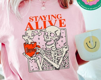 Comfort Colors® Staying Alive T-Shirt, Trendy Coffee Shirt, Coffee Lovers Gift, Skull Vintage Tshirt for Women, Funny Skeleton Shirt