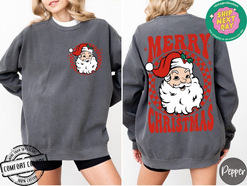 May include: A charcoal gray sweatshirt with a vintage-style illustration of Santa Claus on the front and the text "Merry Christmas" on the back.