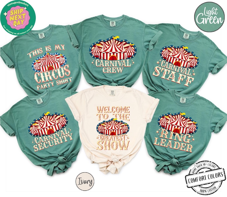 May include: A collection of Comfort Colors t-shirts in various colors, each featuring a circus tent design. The shirts have text such as "Carnival Crew," "Ring Leader," and "This is my Circus Party Shirt."