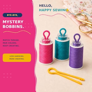 May include: Three sewing bobbins in pink, teal, and purple, each topped with a matching plastic loop. A yellow plastic clip lies below. Text reads: BYE-BYE, MYSTERY BOBBINS. HELLO, HAPPY SEWING. MATCH THREAD. PAIR COLORS. KEEP CREATING. LESS GUESSING. MORE CREATING.