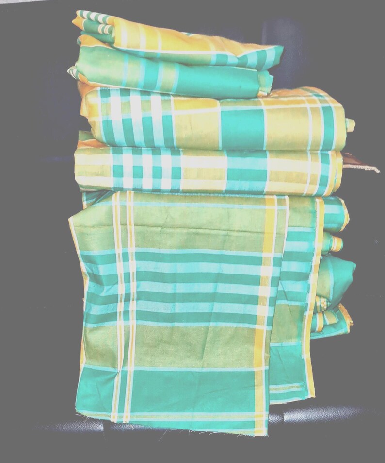 Tela 100% algodón con estampado a cuadros Madras, tejido nacional de Montserrat, para confección de ropa y decoración de eventos nacionales y culturales. imagen 2
