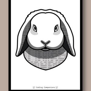 May include: A framed print featuring a stylised illustration of a lop-eared rabbit head. The rabbit's face is white with black outlines, while the ears and lower head area are filled with a repeating binary code pattern of zeros and ones. The text "Coding Companions" is printed at the bottom centre.