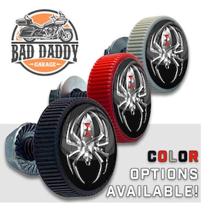 May include: Black spider logo on a round screw-on cap with a metal bolt. The cap is available in red, gray, and black. "COLOR OPTIONS AVAILABLE!" text is below the caps.