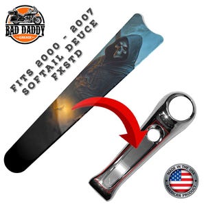 May include: A motorcycle part with a chrome finish and a graphic of a grim reaper. The part is designed to fit 2000-2007 Softail Deuce FXSTD models. The image also includes the Bad Daddy Garage logo and a "Made in the USA" sticker.