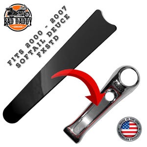 May include: Black motorcycle part with the text "FITS 2000 - 2007 SOFTAIL DEUCE FXSTD". A chrome-colored motorcycle part is also shown. The image includes the "BAD DADDY GARAGE" logo and a "MADE IN THE USA" sticker.
