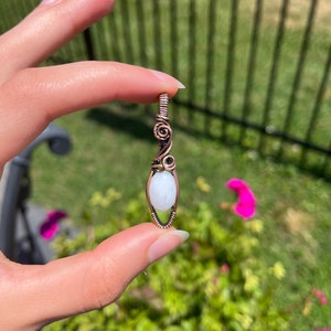 White / Snowy Quartz wire wrapped in copper pendant; polishing pad included; copper chain optional