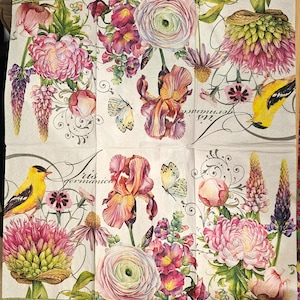 May include: A white background with a floral design featuring pink, yellow, and purple flowers, green leaves, and butterflies. The text "Iris Germanica" is written in cursive on the left side of the image. The text "Iris Germanica" is written in cursive on the right side of the image.