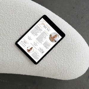 May include: A digital tablet displaying a menu for a prenatal yoga class. The menu includes options for "Follow Me", "Vinyasa", "Prenatal", "Breathing", and "Extras".