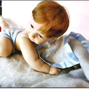 Vintage 1994, “Snug as a Bug in a Rug” 19” Porcelain Boy Doll by Ashton-Drake Galleries. 30 Dollars. OPDC-D001
