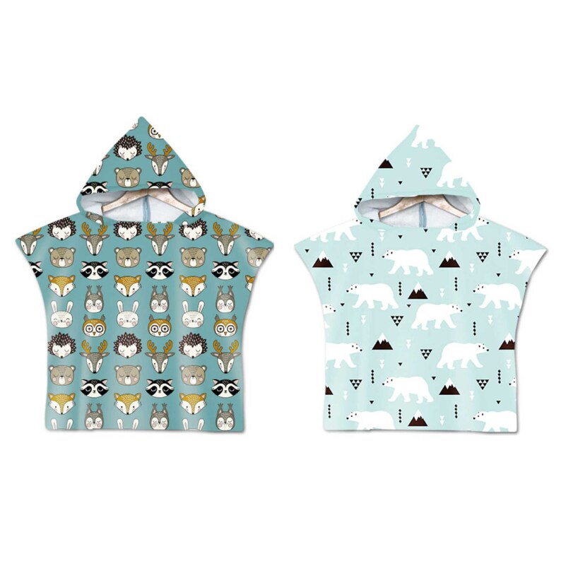 May include: Two hooded towels, one with a blue background and a pattern of woodland animals, and the other with a blue background and a pattern of white polar bears.