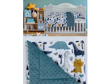 May include: A blue and white dinosaur themed baby blanket with a soft, plush, blue side. The blanket features a variety of dinosaurs, palm trees, and other jungle-themed elements.