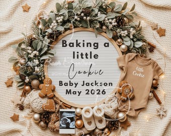 May include: A circular announcement with the text "Baking a little Cookie Baby Jackson May 2026". The announcement is surrounded by a wreath of greenery, ornaments, and gingerbread cookies. A onesie with "little Cookie" is also included.