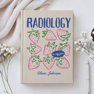May include: A beige book cover with the word "RADIOLOGY" in blue, above a pattern of pink strawberries with green stems. The text "is my jam" is in a blue oval, and the name "Olivia Johnson" is below the strawberries.