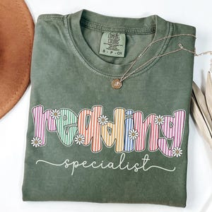 Reading Specialist Shirt, Comfort Colors Reading Teacher Tshirt, Cute Reading Specialist Gift, Colorful Stripes Floral Reading Team T-shirt