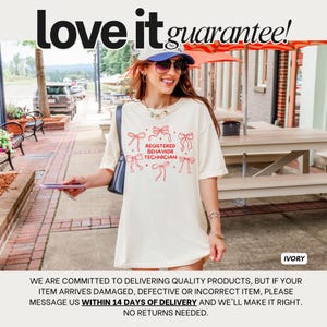 May include: An ivory t-shirt featuring red line art of six bows surrounding the text "REGISTERED BEHAVIOR TECHNICIAN" in a bold, sans-serif font. The shirt has short sleeves and a crew neckline, presented in a casual, loose-fitting style.