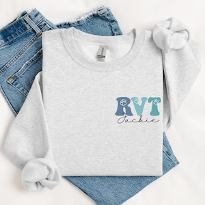 Personalized RVT Sweatshirt with Paw Print, Custom Vet Tech Sweatshirt, Registered Veterinary Technician Crewneck, Vet Tech Gift with Name