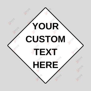 May include: A white diamond-shaped sign with a black border. The sign has the text "YOUR CUSTOM TEXT HERE" in black.