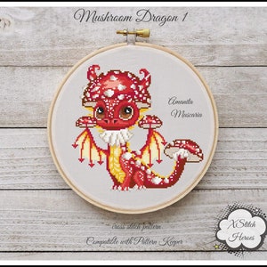 May include: Cross stitch pattern of a red and yellow mushroom dragon with white spots. The dragon is wearing a red and white mushroom cap with white spots. The text "Amanita Muscaria" is written in black above the dragon. The text "Cross stitch pattern Compatible with Pattern Keeper" is written below the dragon. The text "X Stitch Heroes" is written in a white cloud with a star.