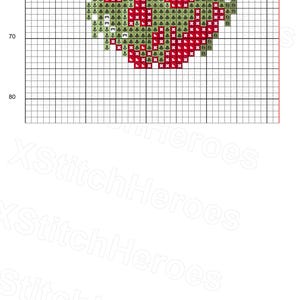 May include: Cross-stitch pattern chart titled "Evil symbols large." The design features a heart-shaped pattern in red and green, with various symbols. The chart is on a grid, with the XStitchHeroes logo at the bottom.