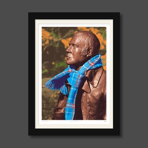 ‘Hap Up, Rabbie!’ art print, mounted and framed. A statue of Scots bard Robert (Rabbie) Burns with a colourful scarf wrapped around it.