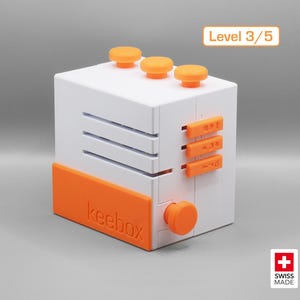Caja de escape naranja Keebox - Escape Room en una caja / Puzzlebox de descubrimiento secuencial