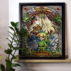 Puede incluir: Una obra de arte de vitrales enmarcada que presenta una colorida representaci&oacute;n de Link y Zelda de la serie de videojuegos The Legend of Zelda. La obra de arte est&aacute; sobre un fondo de intrincados patrones y enredaderas.
