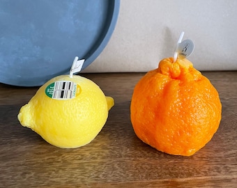 Fun quirky scented orange and lemon real looking fruit set candles handmade home decor great gift present geometric sculpture soy wax candle