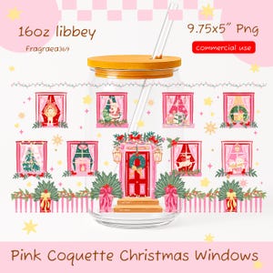 May include: A clear 16oz Libbey glass tumbler with a bamboo lid and glass straw, featuring a pink Christmas window design. The graphic includes a red front door with a wreath, festive windows with holiday scenes, and pink picket fencing.