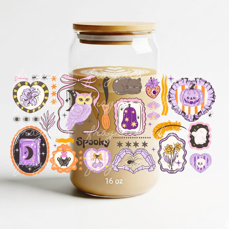 May include: A clear glass jar with a wooden lid, filled with a beige liquid. The jar is decorated with Halloween-themed stickers, including an owl, a cat, and a pumpkin. The text "frag Spooky" and "16 oz" are visible.