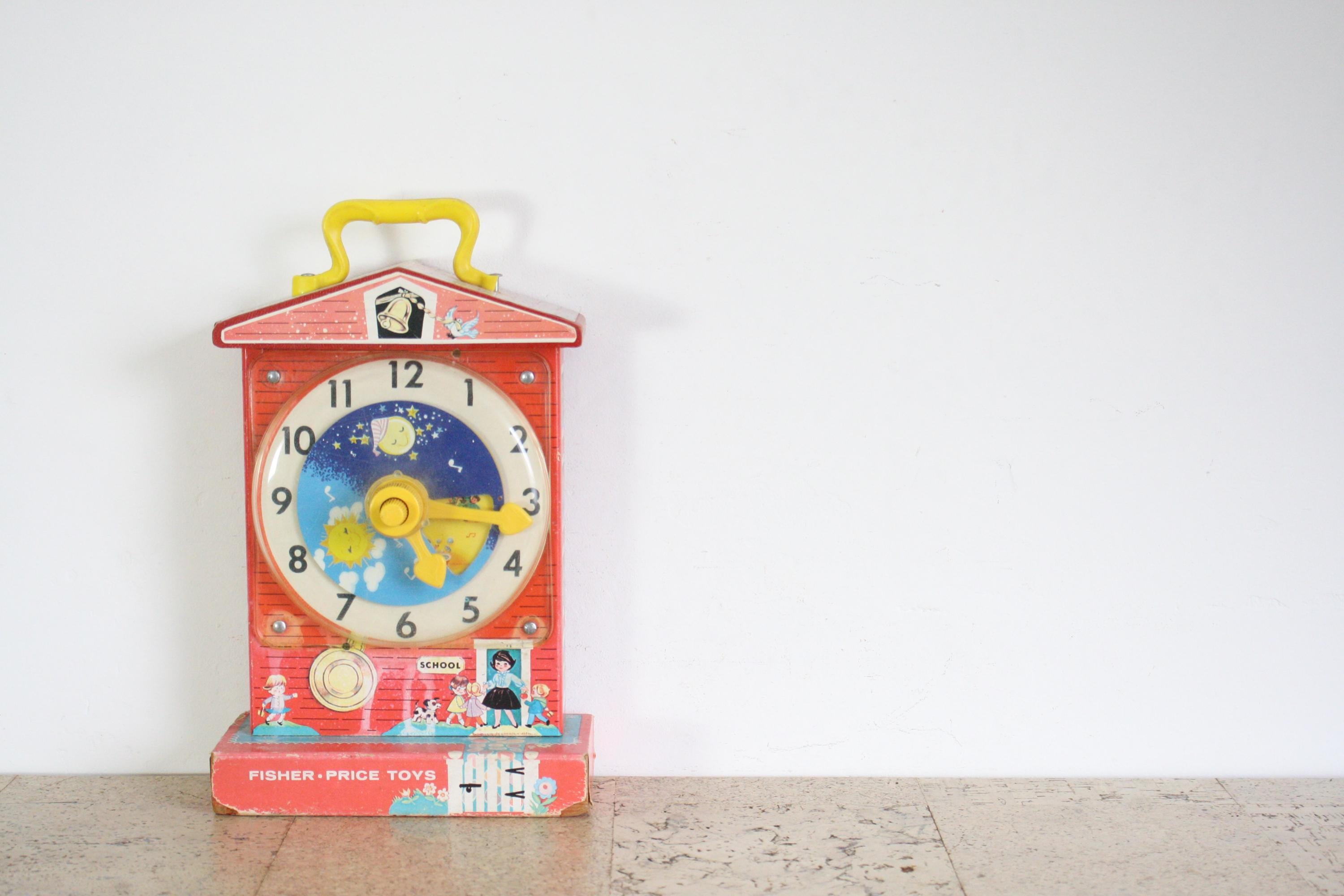 アメリカ 60年代 Fisher-Price Clock 音楽ボックス Vintage Fisher Price Music Box Teaching Clock (1960s) - Etsy