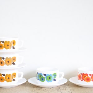 Vintage Arcopal tea / coffee cup and saucer with flowers, lotus design