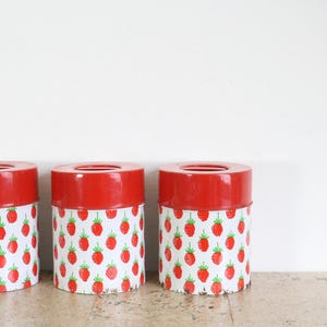 Three vintage metal tins with strawberries from Holland