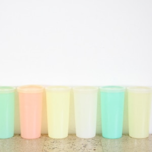 Vintage Tupperware cups with lids from the seventies