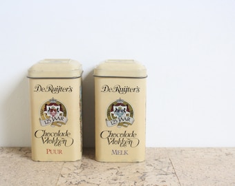 Two vintage De Ruijter Chocolade vlokken metal tins from the eighties