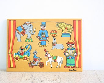 Wooden circus puzzle from Simplex toys in original box, made in Holland