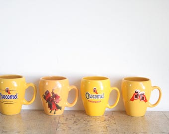 Juego de cuatro tazas Chocomel amarillas, de enige echte de Nutricia