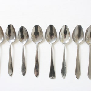 Ten mismatched breakfast spoons from the seventies - set 1