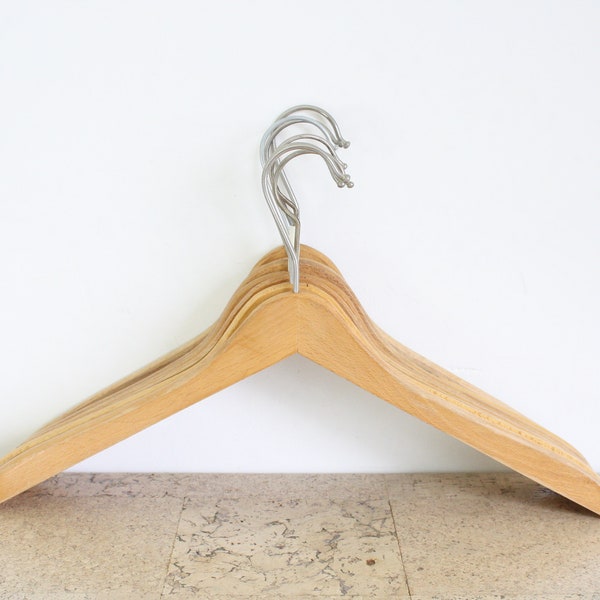Seven vintage wooden clothes hangers from the seventies