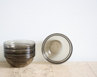 Vintage set of four smoked glass bowls from Arcoroc from the seventies