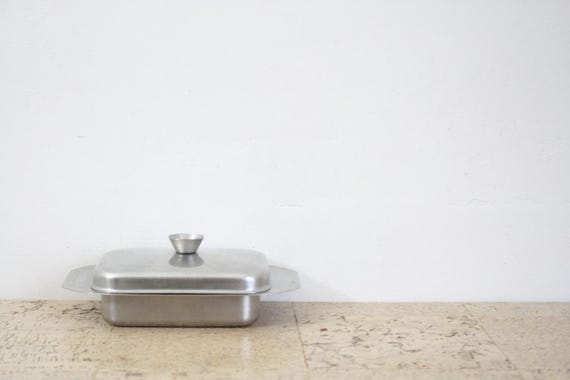 A Vintage Leeuwezegel stainless butter dish from the fifties