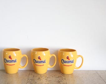 Set de tres tazas Chocomel amarillas, de enige echte de Nutricia