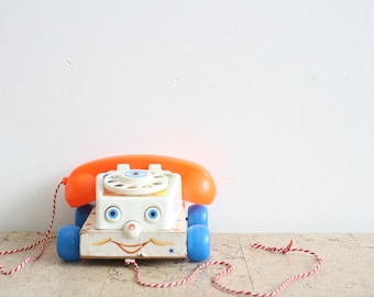 Teléfono parlante vintage Fisher Price de los años sesenta