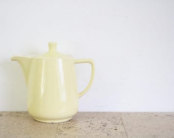 Vintage light yellow Melitta tea pot, from the sixties