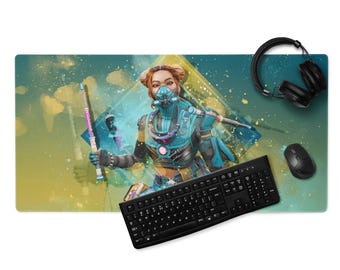 May include: A blue and green gaming mouse pad featuring a female character with a blue and white mask holding a weapon. The character is standing in front of a yellow and blue background with a diamond shape. The mouse pad also includes a black keyboard and a black headset.