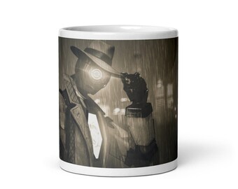 May include: White ceramic mug featuring a sepia-toned illustration of a figure in a fedora and trench coat, holding a lantern in a rainy cityscape. The design has a noir aesthetic, with a futuristic, robotic element.