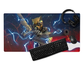 May include: A gaming mouse pad featuring a stylized illustration of a character wearing a yellow and black helmet and holding a weapon. The background is a dark blue and red color with white lightning bolts. The mouse pad also includes a black keyboard and a black wireless mouse.