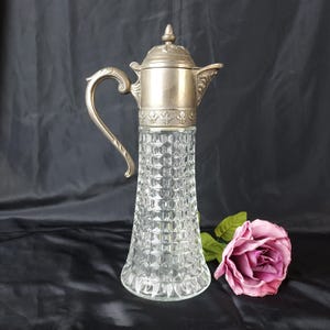 Italian claret jug with silver plated mount and ice insert