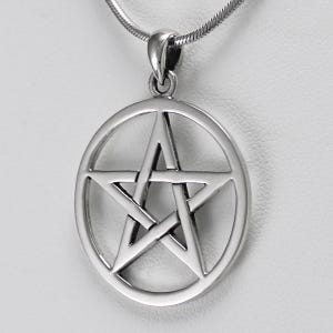 May include: A silver pendant necklace featuring a pentagram, or five-pointed star, within a circle.